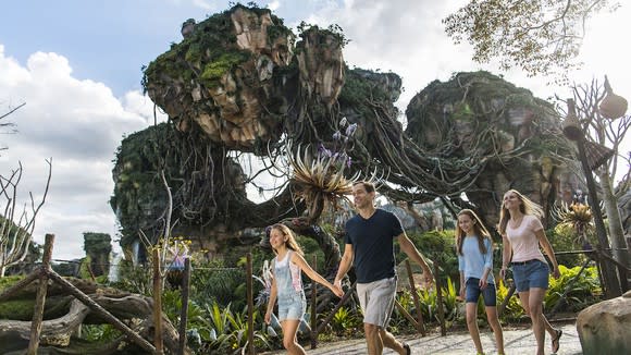 A family walks through Pandora -- The World of Avatar at Disney's Animal Kingdom.