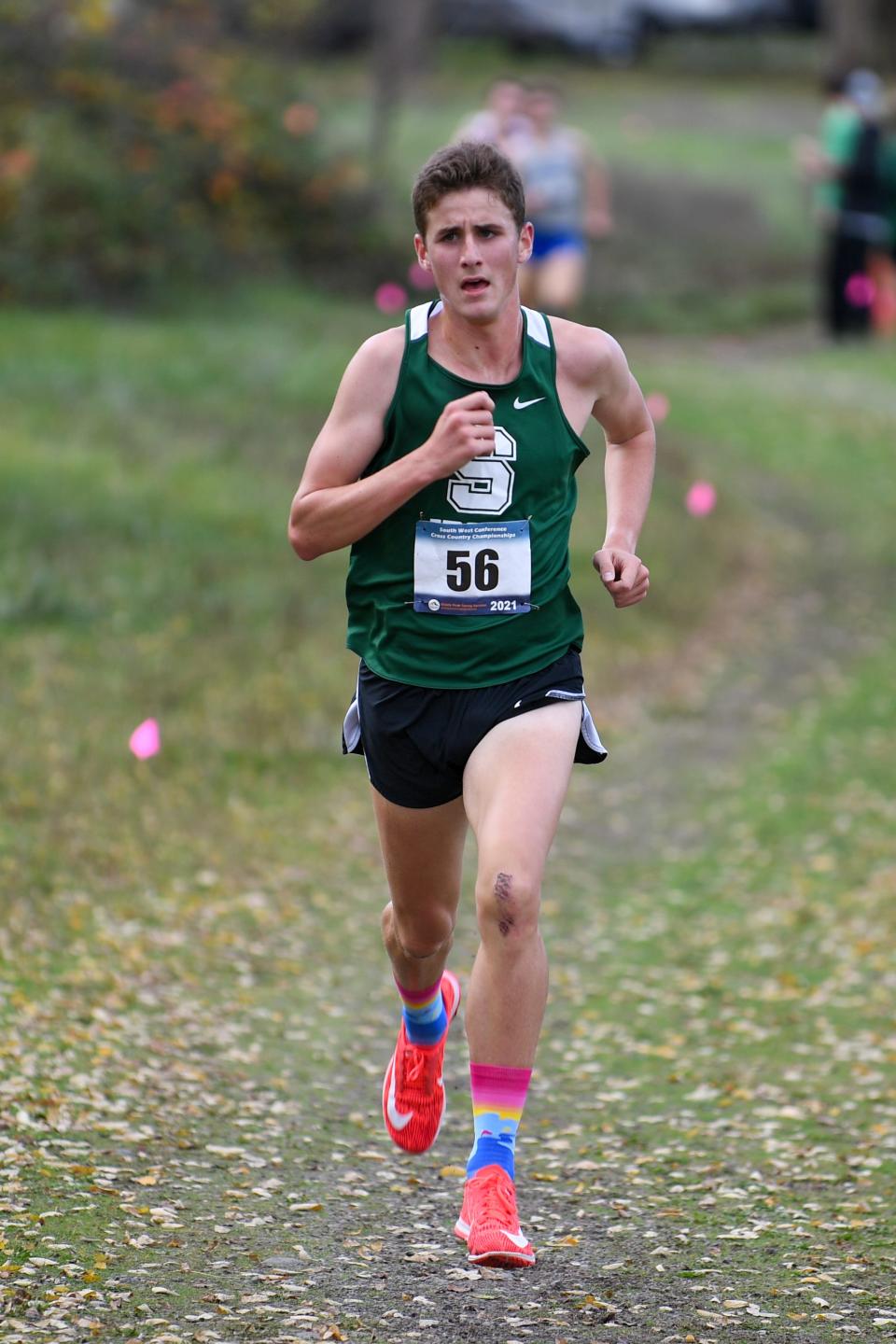 Sheldon's Ben Collins on his way to a 3rd overall finish at the 6A-7 Southwest XC Conference Championships at Valley of the Rogue State Park on October 27, 2021. (Chris Poulsen/Dark Shift Photography)