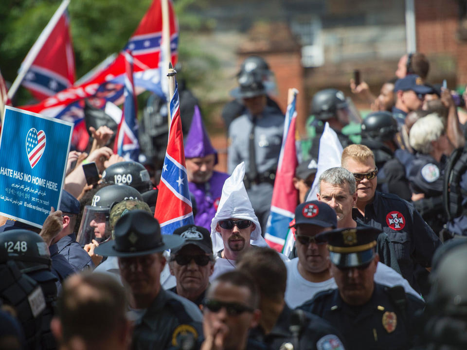 Protesters, including members of the Ku Klux Klan, protest against the removal of a Confederate statue on July 8, 2017: AFP/Getty Images