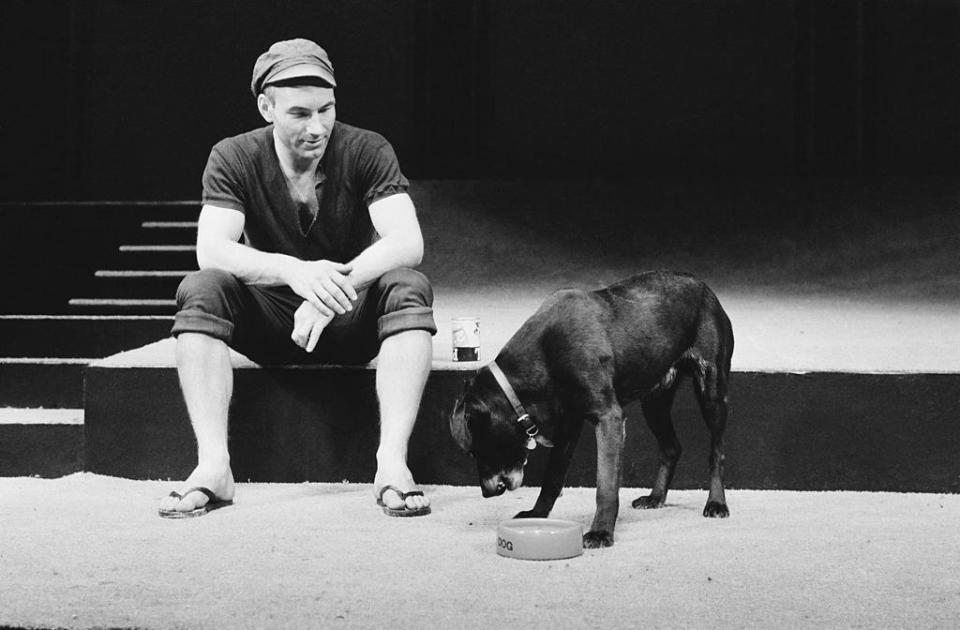 Sitting with a dog in black and white