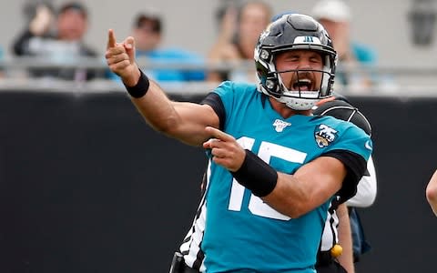 Jacksonville Jaguars quarterback Gardner Minshew II celebrates after running for a first down and drawing a penalty against the New York Jets during the second half of an NFL football game, Sunday, Oct. 27, 2019, in Jacksonville, Fla - Credit: AP