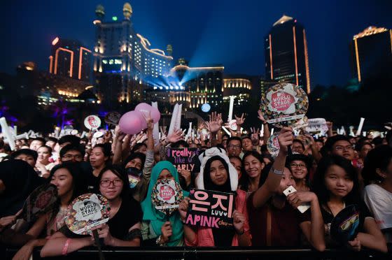 Fans attend MTV World Stage Malaysia at Sunway Lagoon on Sept. 12, 2015.<span class="copyright">Kristian Dowling—Getty Images</span>