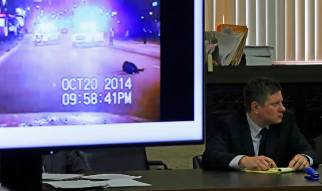 A police vehicle dash cam video of the moments after Laquan McDonald was fatally shot is displayed for jurors, as Chicago police officer Jason Van Dyke attends his first degree murder trial on Oct. 3, 2018, for the shooting death of McDonald.