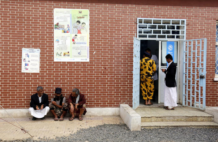 <p>Yemenis wait for their children suspected of being infected with cholera receiving treatment at a hospital in Sana’a, Yemen on June 15, 2017. (Yahya Arhab/EPA/REX/Shutterstock) </p>