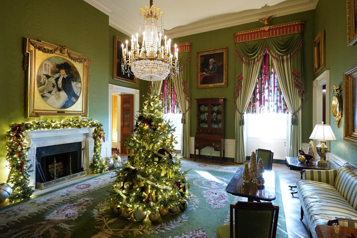 The Green Room of the White House is decorated for the holiday season during a press preview of holiday decorations at the White House, Monday, Nov. 28, 2022, in Washington. (AP Photo/Patrick Semansky)