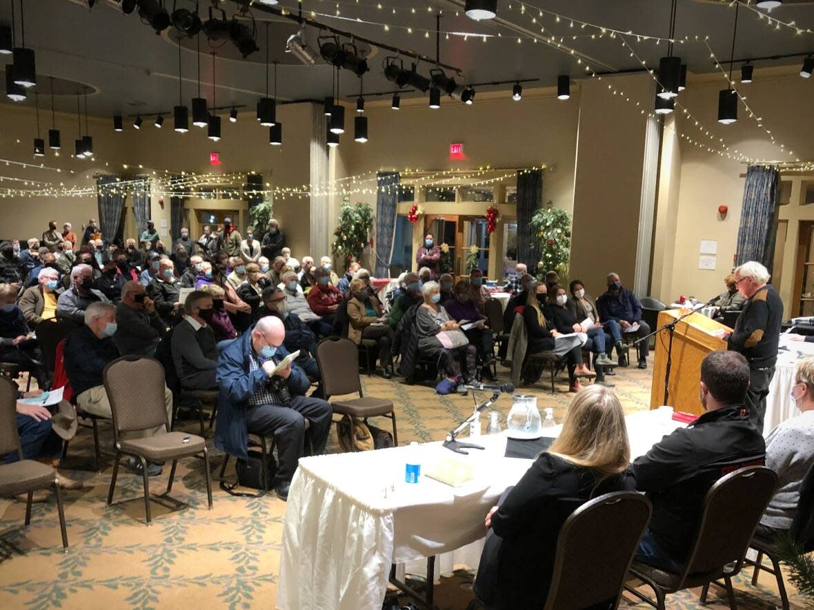 More than 150 people attended a Village of Baddeck special meeting called to discuss the possibility of dissolving the village and joining with Victoria County. (Tom Ayers/CBC - image credit)