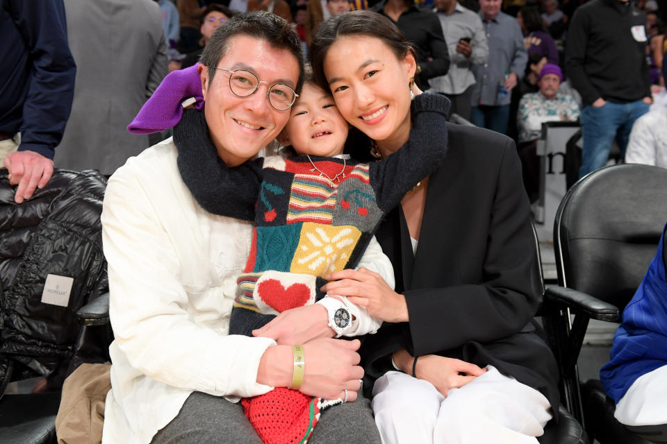 Edison Chen, wife Shu Pei and daughter Alaia Chen attend a basketball game between the Los Angeles Lakers and the Los Angeles Clippers at Staples Center. - Credit: Getty Images