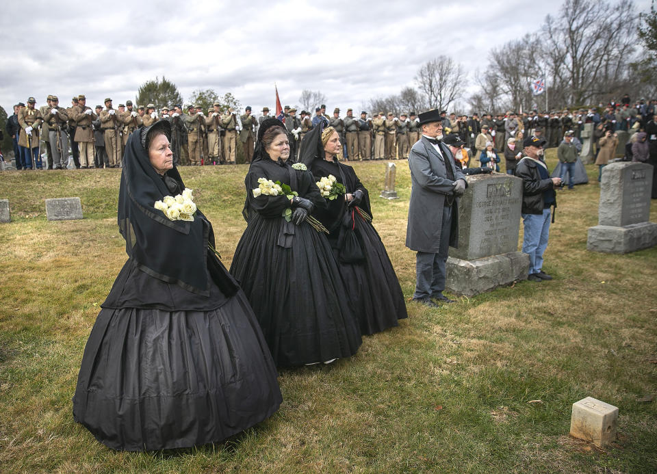 People attend the ceremony as the remains of Civil War Gen. A.P. Hill are interred at Fairview Cemetery in Culpeper, Va., Saturday, Jan. 21, 2023. (Peter Cihelka/The Free Lance-Star via AP)