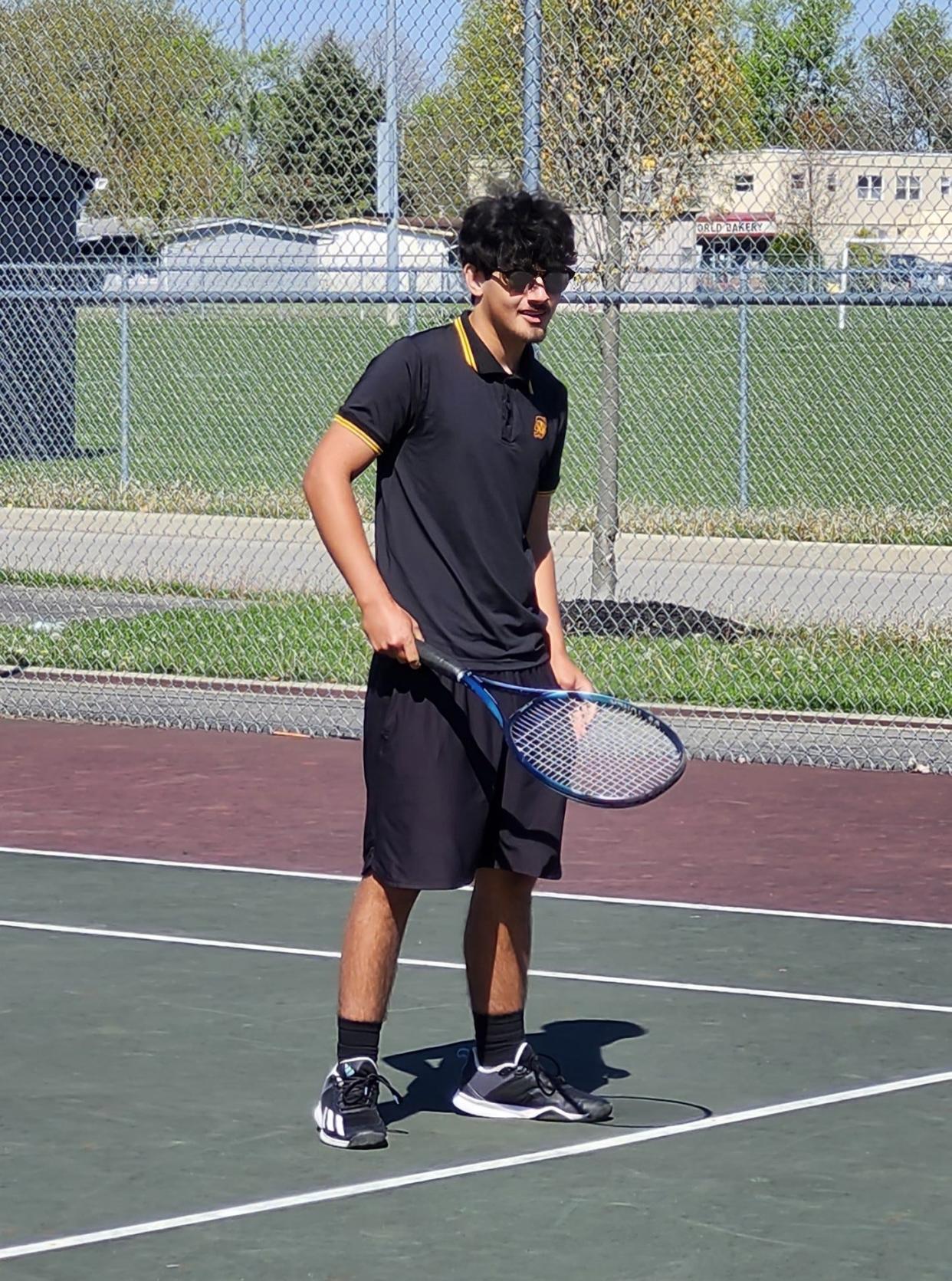 Nathaniel Wimbley, shown here warming up before a match Monday against Grove City, is one of several seniors leading Franklin Heights' quest for a second consecutive winning season and only its second this century.