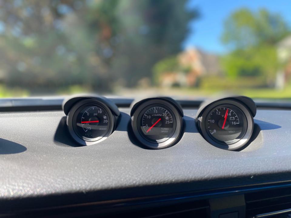 The instrument gauges atop the front dash of a 2024 Nissan Z sports car.