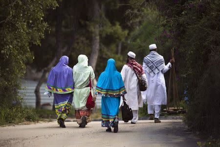 Shi'ite Muslim pilgrims from India leave after praying at a shrine located on the grounds of Barzilai Medical Center in the coastal town of Ashkelon February 8, 2015. REUTERS/Amir Cohen