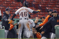 Detroit Tigers' Jeimer Candelario (46) dances on the dugout steps after his three-run home run during the 10th inning of the team's baseball game against the Boston Red Sox at Fenway Park, Wednesday, May 5, 2021, in Boston. (AP Photo/Charles Krupa)