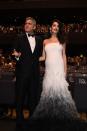 <p><strong>On a aimé</strong> : c’était indubitablement le couple le plus attendu de la soirée. George et Amal Clooney n’ont pas failli. L’avocate était sublime dans une longue robe blanche qui laissait deviner son baby-bump.<br> Crédit : AFP </p>