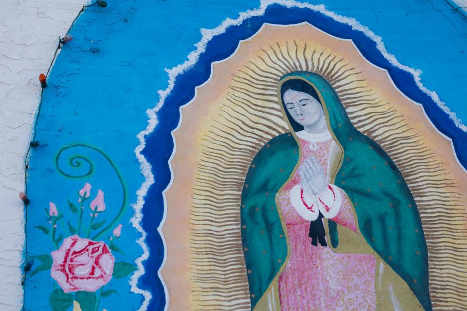 "La Virgen de Guadalupe" was painted by Felipe Adame, assisted by Jesus "Machido" Hernandez in 1981, restored in 1991. The Mural is located at the exterior west wall of an apartment complex at 900 S. Ochoa St. in Segundo Barrio in El Paso, Texas.