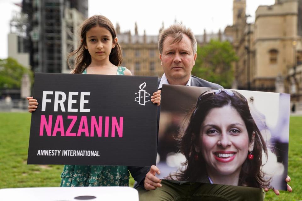 Richard Ratcliffe and his daughter Gabriella in Parliament Square (Kirsty O’Connor/PA) (PA Wire)