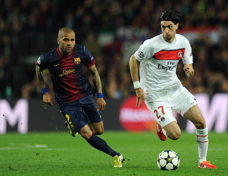 Barcelona defender Dani Alves (L) and PSG's Javier Pastore are pictured during their Champions League match on April 10, 2013. Barcelona went behind for the first time in the tie when Pastore struck shortly after half-time