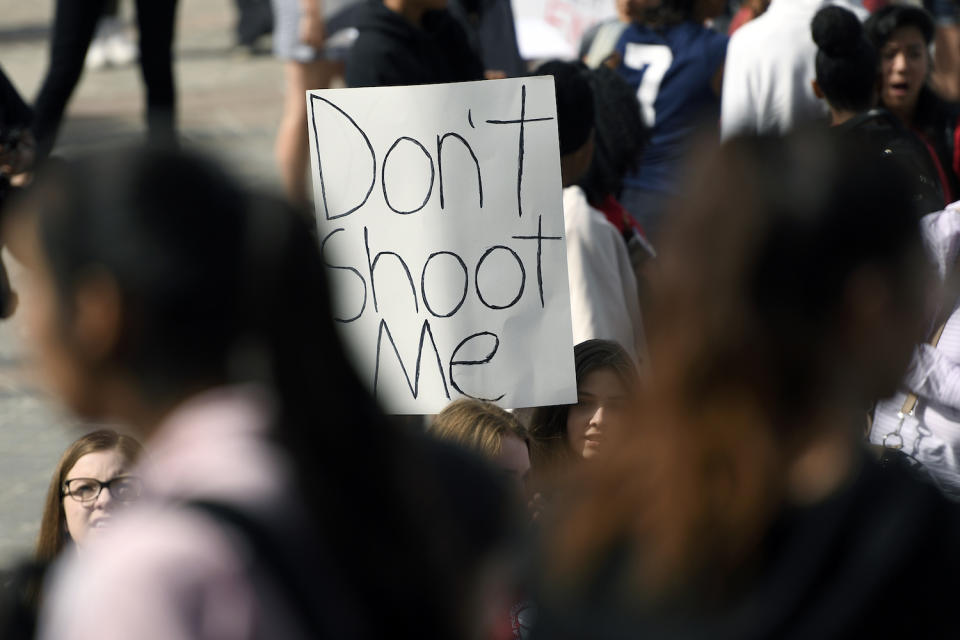 <p>High school students at the Denver State Capitol take part in a national walkout to protest gun violence.<br> (Photo: Getty Images) </p>