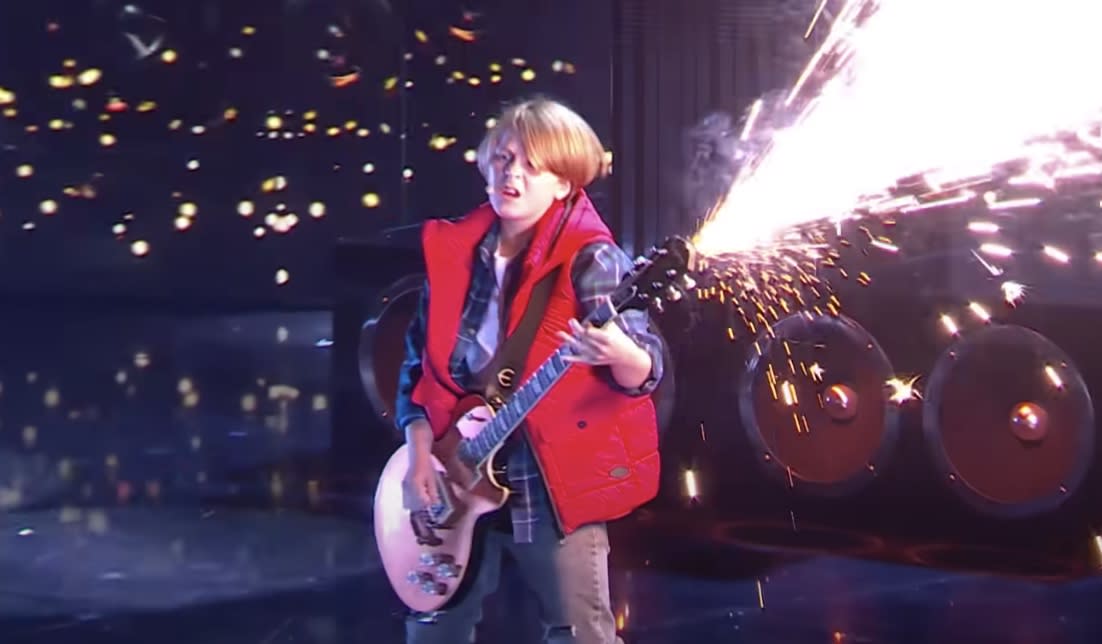  11-year-old Harry Churchill wields an Epiphone Les Paul laden with sparklers on the stage of Britain's Got Talent 