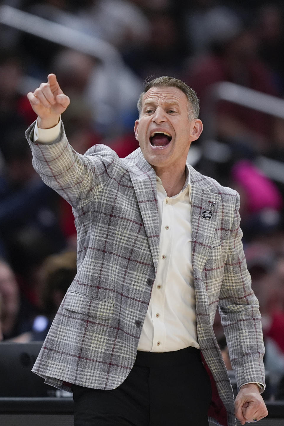 Alabama head coach Nate Oats yells out instructions during the first half of a Sweet 16 college basketball game against North Carolina in the NCAA tournament Thursday, March 28, 2024, in Los Angeles. (AP Photo/Ryan Sun)