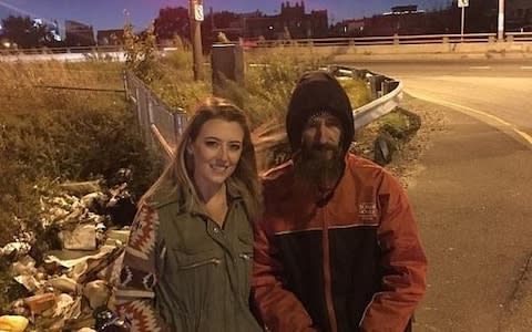 Johnny Bobbitt and Kate McClure pose at a CITGO station in Philadelphia - Credit: Gofundme