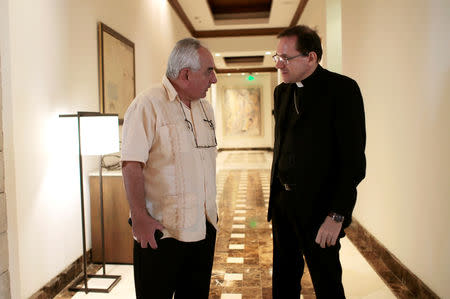 Special envoy of the OAS General Secretariat Luis Angel Rosadilla speaks with Apostolic Nuncio in Nicaragua, Waldemar Stanislaw Sommertag after a meeting with Cristobal Fernandez, chief of the Department of Cooperation and Electoral Observation of OAS in Managua, Nicaragua April 24, 2019. REUTERS/Oswaldo Rivas