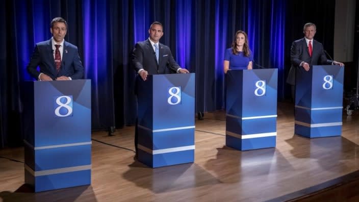 Michigan Republican candidates for governor — (from left) Ryan Kelley of Allendale, Garrett Soldano of Mattawan, Tudor Dixon of Norton Shores and Kevin Rinke of Bloomfield Township — appear at a debate Wednesday in Grand Rapids, Michigan. (Photo: Michael Buck/WOOD TV8 via AP, File)