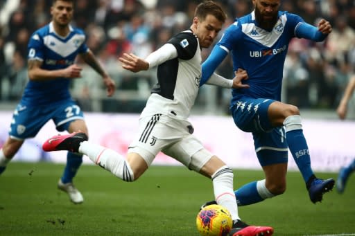 Aaron Ramsey (C) in action for Juventus against Brescia in Serie A on Sunday