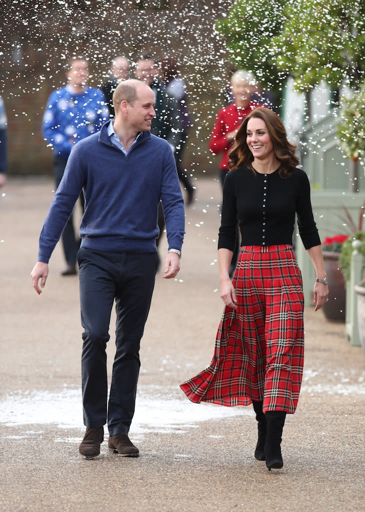 Look no further for festive inspiration, as the Duchess of Cambridge just proved tartan is back [Photo: PA]