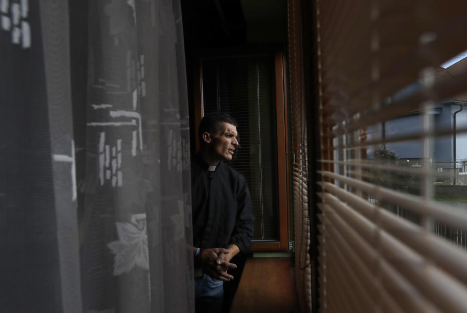 Roman Catholic priest Michal Lajcha looks out in Klak, Slovakia, Monday, Sept. 17, 2018. Lajcha is challenging the Roman Catholic Church’s celibacy rules in a rare instance of dissent in the conservative religious stronghold in central and eastern Europe. (AP Photo/Petr David Josek)