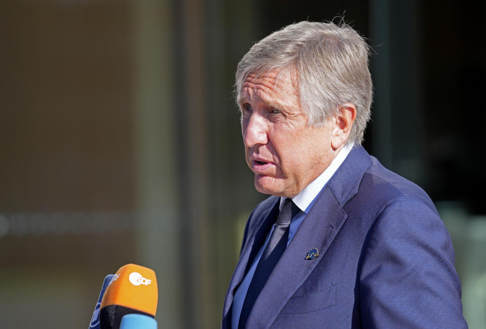 Luxembourg's Defense Minister Francois Bausch speaks with the media as he arrives for a meeting of EU defense ministers at the Brdo Congress Center in Kranj, Slovenia, Thursday, Sept. 2, 2021. (AP Photo/Darko Bandic)