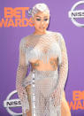 <p>Not one to shy away from the camera, Blac Chyna paired her see-through ensemble with silver finger waves. (Photo: Getty Images) </p>