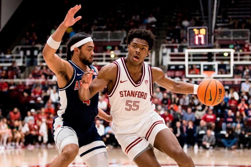 Stanford Cardinal forward Harrison Ingram (55) drives against Arizona Wildcats guard Kylan Boswell (4) during the first half at Maples Pavilion on Feb. 11, 2023.