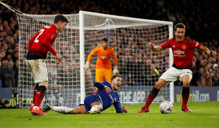 Soccer Football - FA Cup Fifth Round - Chelsea v Manchester United - Stamford Bridge, London, Britain - February 18, 2019 Chelsea's Eden Hazard in action with Manchester United's Ander Herrera and Victor Lindelof Action Images via Reuters/John Sibley