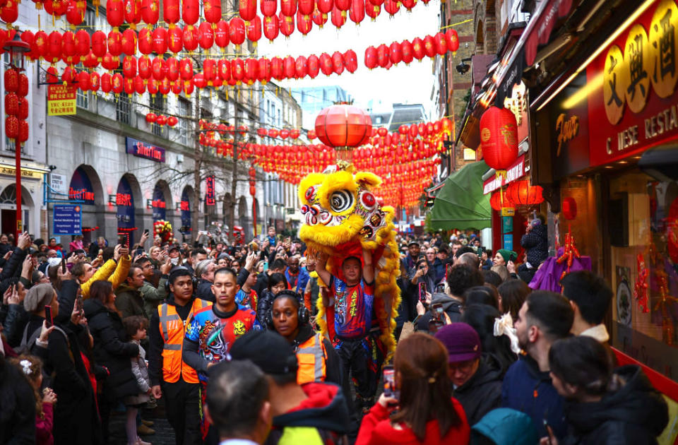 A Chinese Lion Dance team performed for spectators during celebrations for the Lunar New Year of the Dragon in Chinatown, London, on Feb. 10, 2024.<span class="copyright">Henry Nicholls—Getty Images</span>