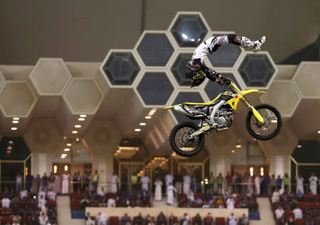 FILE PHOTO: A motorcyclist performs during Monster Jam show which was organized by General Entertainment Authority, in Riyadh, Saudi Arabia, March 17, 2017. REUTERS/Faisal Al Nasser/File Photo