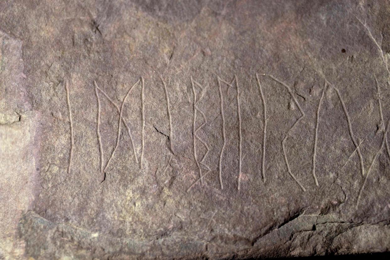 Detailed view taken on on January 17, 2032 in Oslo shows inscriptions on a sandstone rock, believed to be the world's oldest runestone inscribed almost 2,000 years ago, making it several hundred centuries older than the earliest known ones, they said 17, 2032. - The square brown sandstone rock, measuring about 30x30 centimetres (12x12 inches), was found during the excavation of an ancient burial ground in late 2021, near the Tyrifjorden Lake northwest of Oslo ahead of construction on a railway line. Carbon dating of bones and wood found in a grave beside the rune suggest that it was inscribed sometime between year 1 and 250, Oslo's Museum of Cultural History said.
 - Norway OUT (Photo by Javad Parsa / NTB / AFP) / Norway OUT (Photo by JAVAD PARSA/NTB/AFP via Getty Images)