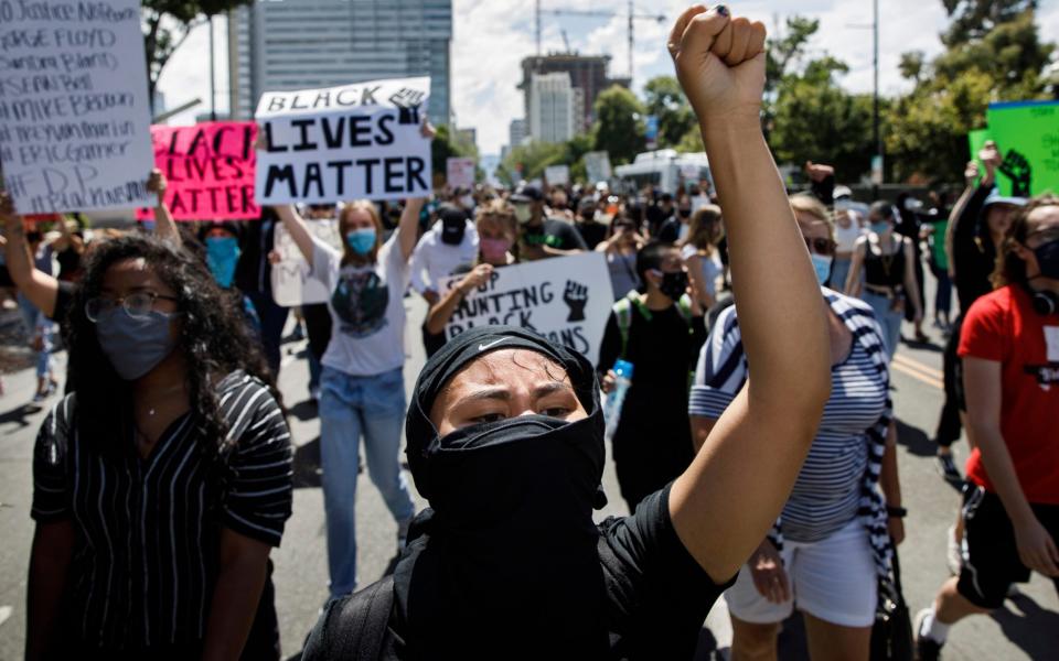 People protesting the death of George Floyd in Minneapolis police custody march in San Jose - Bay Area News Group