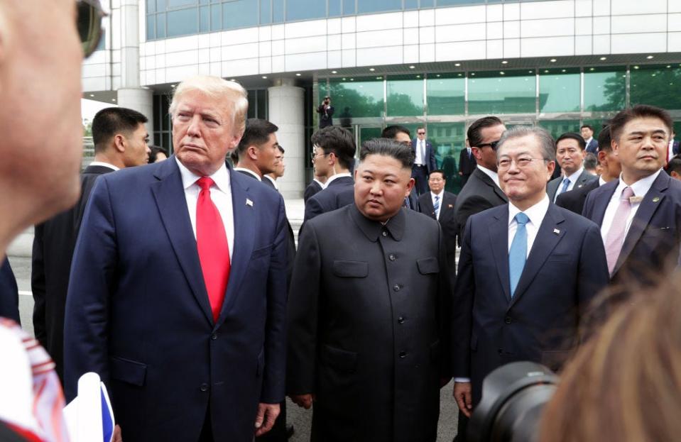 A handout photo provided by Dong-A Ilbo of North Korean leader Kim Jong Un, U.S. President Donald Trump, and South Korean President Moon Jae-in inside the demilitarized zone (DMZ) separating the South and North Korea on June 30, 2019 in Panmunjom, South Korea