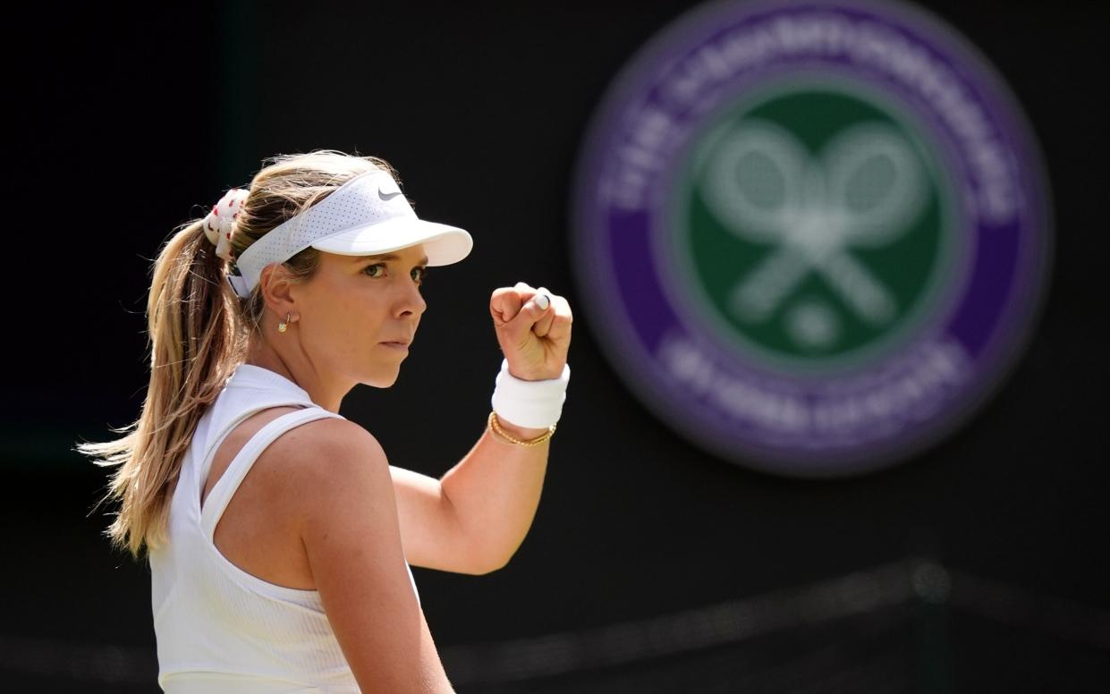 Katie Boulter celebrates winning the first set against Harriet Dart (not pictured) on day four of the 2024 Wimbledon Championships at the All England Lawn Tennis and Croquet Club, London