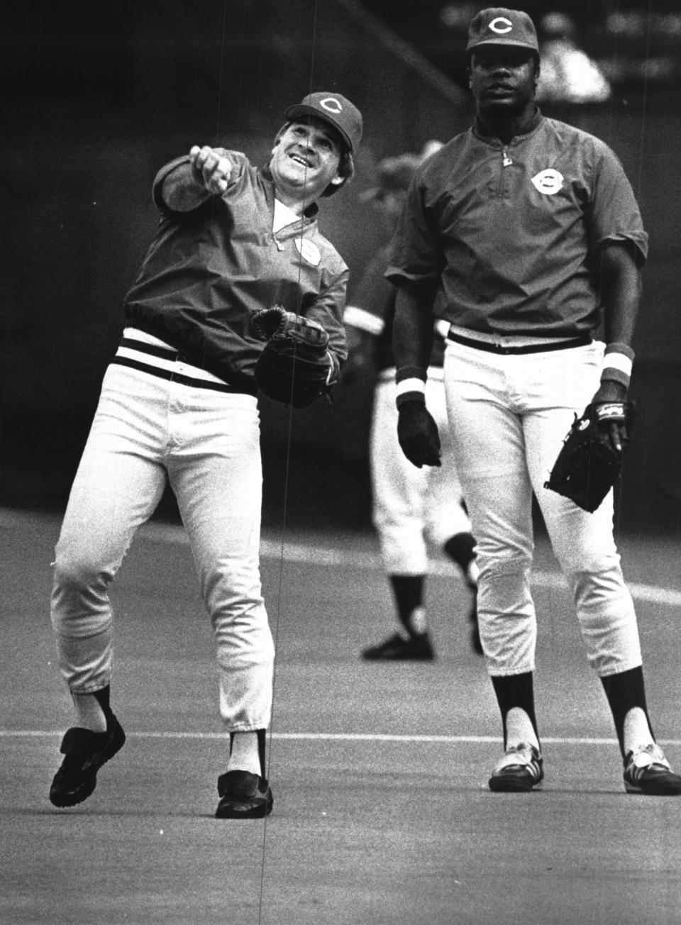 SEPTEMBER 11, 1985: The expressions of the faces of Dave Parker and Pete Rose tell a lot about what they have been going through lately. Rose, of course, is about to break Ty Cobb's all-time record for career hits, baseball's oldest major record, while Parker is about to appear in the trial of an accused Pittsburgh drug dealer.