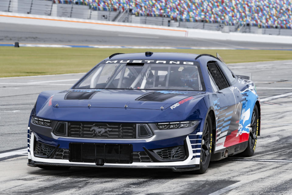 This photo provided by Ford Performance shows the 2024 NASCAR Cup Series Mustang at Daytona International Speedway in Daytona Beach, Fla., Oct. 26, 2023. Ford Performance said Wednesday, Nov. 1, 2023, it will use the new Mustang Dark Horse in NASCAR’s top Cup Series next year. Ford is transitioning to the Dark Horse for its racing product and the Mustang will be eligible to race on six continents in 2024. (Mike Meadows/Ford Performance via AP)