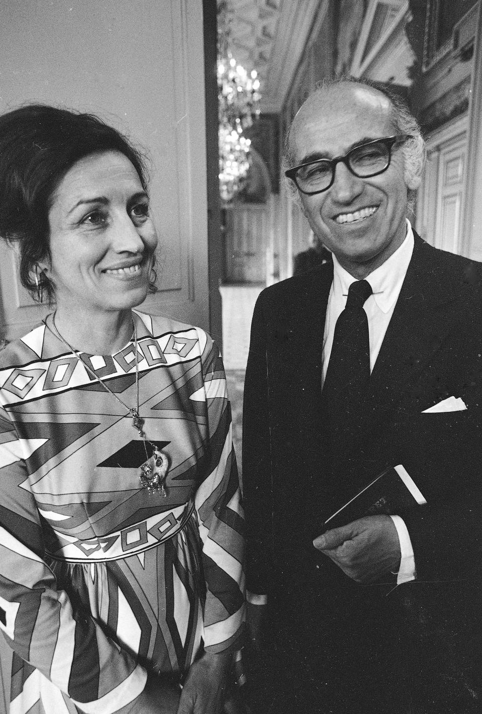 FILE - Dr. Jonas Salk, right, developer of the polio vaccine, and artist Francoise Gilot appear following their civil wedding at Paris Neuilly Town Hall on June 30, 1970. Gilot, a prolific and acclaimed painter who produced art for well more than a half-century but was nonetheless more famous for her turbulent relationship with Pablo Picasso — and for leaving him — died Tuesday in New York, where she had lived for decades. She was 101. (AP Photo/Laurent Rebours, File)