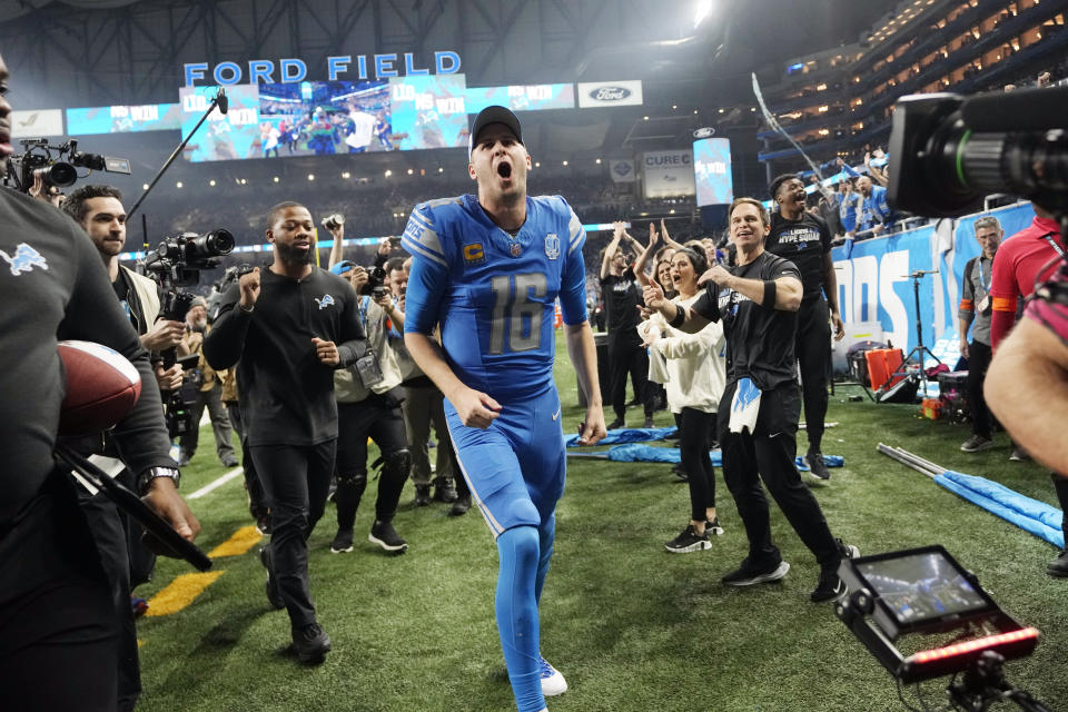 Detroit Lions quarterback Jared Goff walks off the field after an NFL wild-card playoff football game against the Los Angeles Rams, Sunday, Jan. 14, 2024, in Detroit. (AP Photo/Paul Sancya)