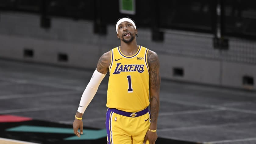 The Lakers' Kentavious Caldwell-Pope walks up the court against the San Antonio Spurs on Jan. 1, 2021.