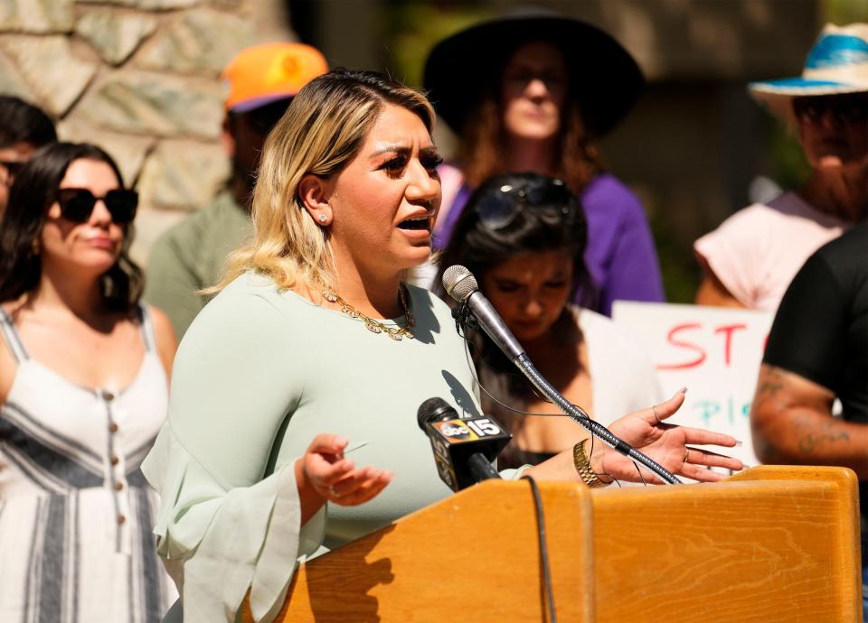 State Rep. Alma Hernandez (District 20) addresses a crowd of protesters gathered outside the Arizona Capitol on July 13, 2023, in Phoenix.