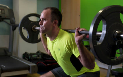 James Carson lifting weights after his recovery from a hernia - Credit:  Geoff Pugh for the Telegraph