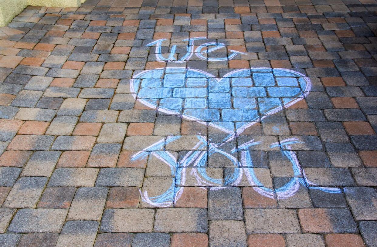 sidewalk pavers with chalk message