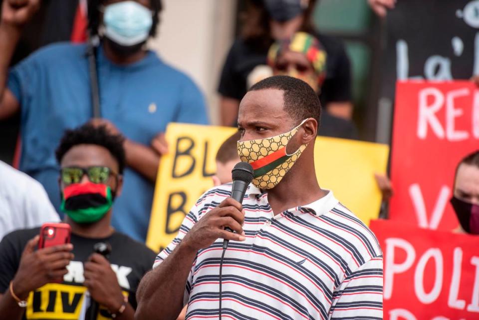 Jeremy Parker, a relative of La’Mello Parker, speaks in front of the Gulfport Police Department on Wednesday, Sept. 8, 2021.