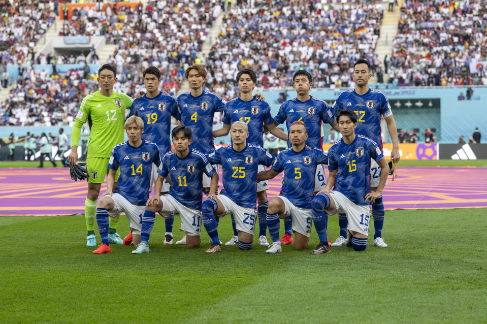 DOHA, QATAR - NOVEMBER 23: Japan pose for their starting XI photo before a FIFA World Cup Qatar 2022 Group E match between Japan and Germany at Khalifa International Stadium on November 23, 2022 in Doha, Qatar. (Photo by Brad Smith/ISI Photos/Getty Images)