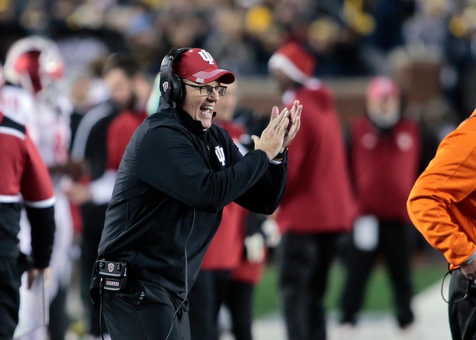 Indiana head coach Tom Allen cheers on his offense after a touchdown in the second quarter of an NCAA college football game against Michigan in Ann Arbor, Mich., Saturday, Nov. 6, 2021. (AP Photo/Tony Ding)